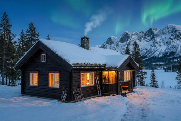 Koselig hytte i vinterlandskap